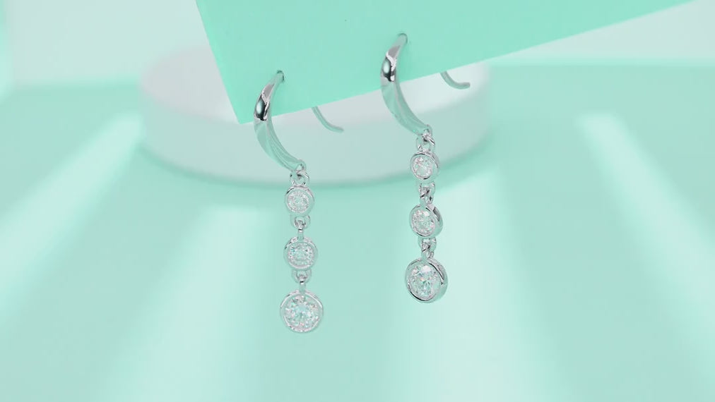 Trickle Moissanite Drop Earrings in Sterling Silver — video