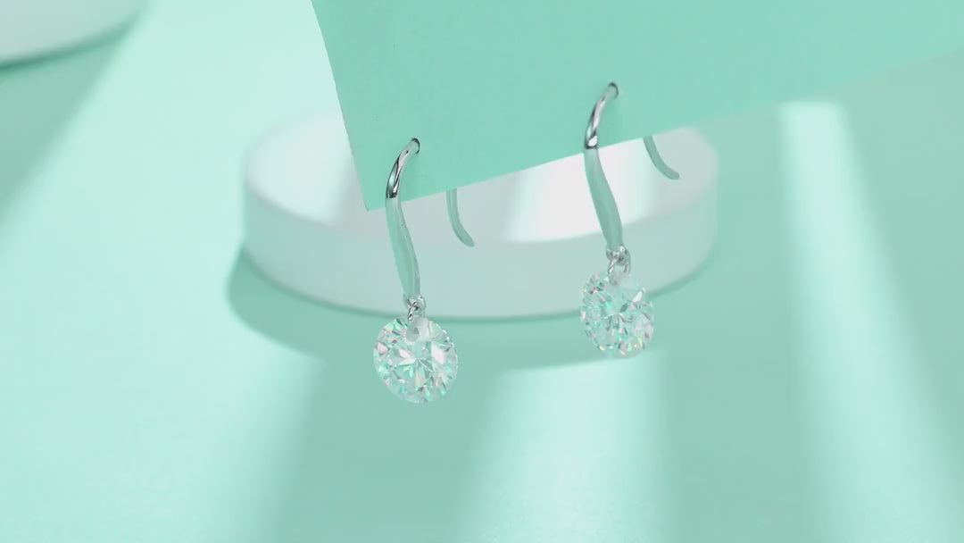 Rivulet Moissanite Three-Stone Drop Earrings in Sterling Silver — video