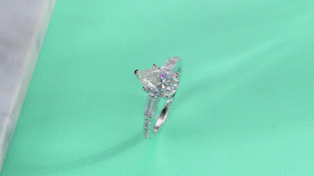 Moonlight Pear-Cut Moissanite Three-Stone Ring in Sterling Silver — video