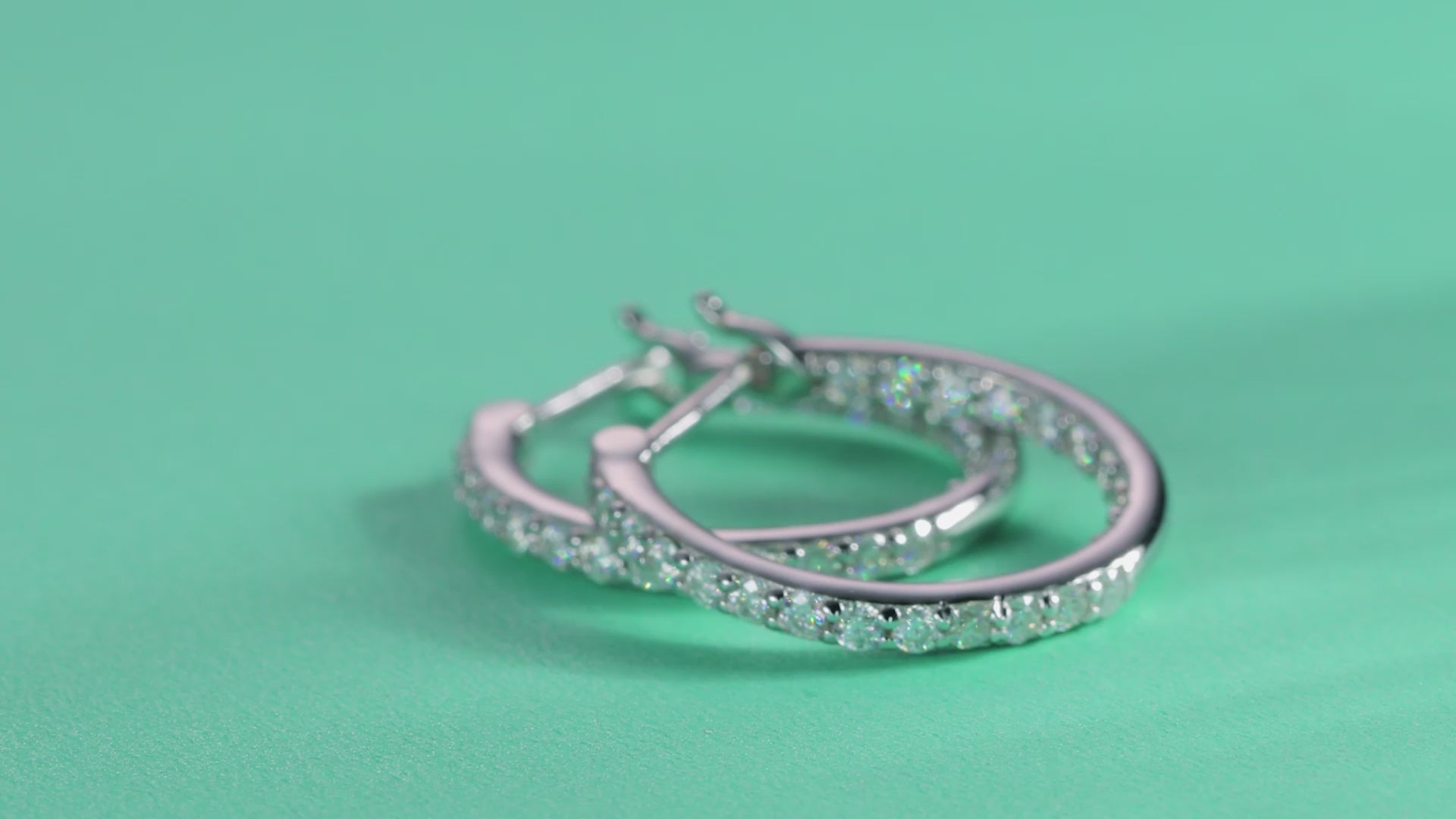 Glimmer Moissanite Hoop Earrings in Sterling Silver — video