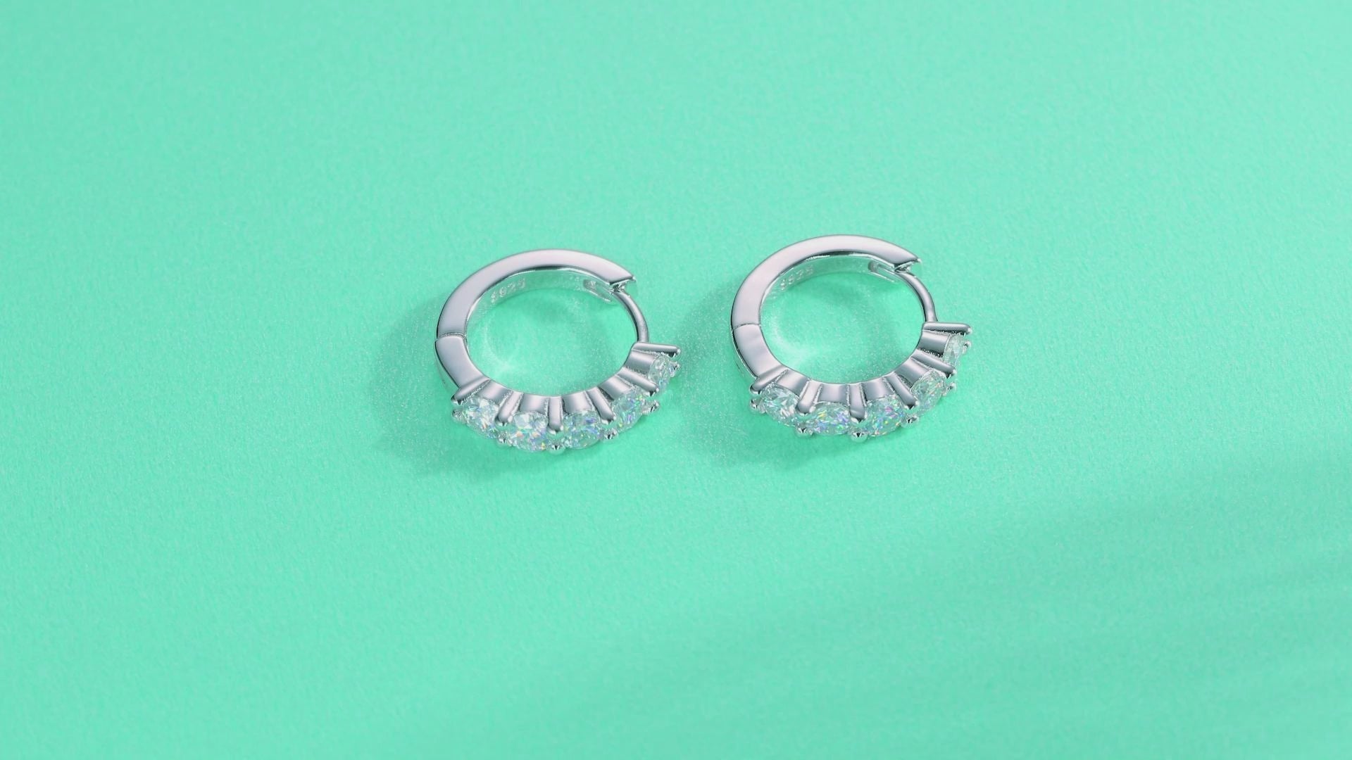 Daybreak Moissanite Huggie Hoop Earrings in Sterling Silver — video