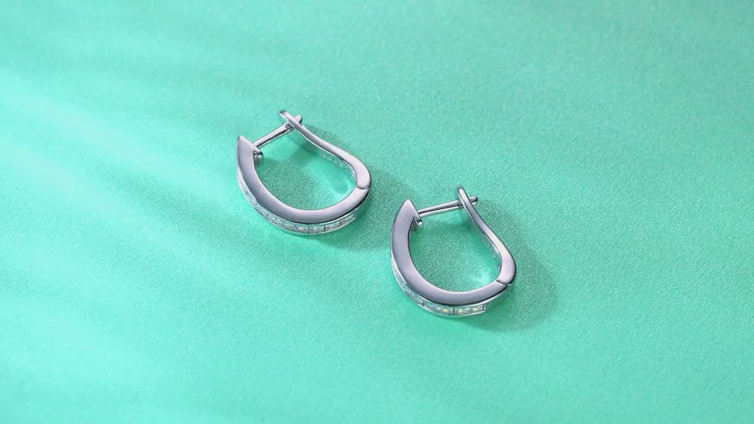 Arch Moissanite Baguette Huggie Hoop Earrings in Sterling Silver — video
