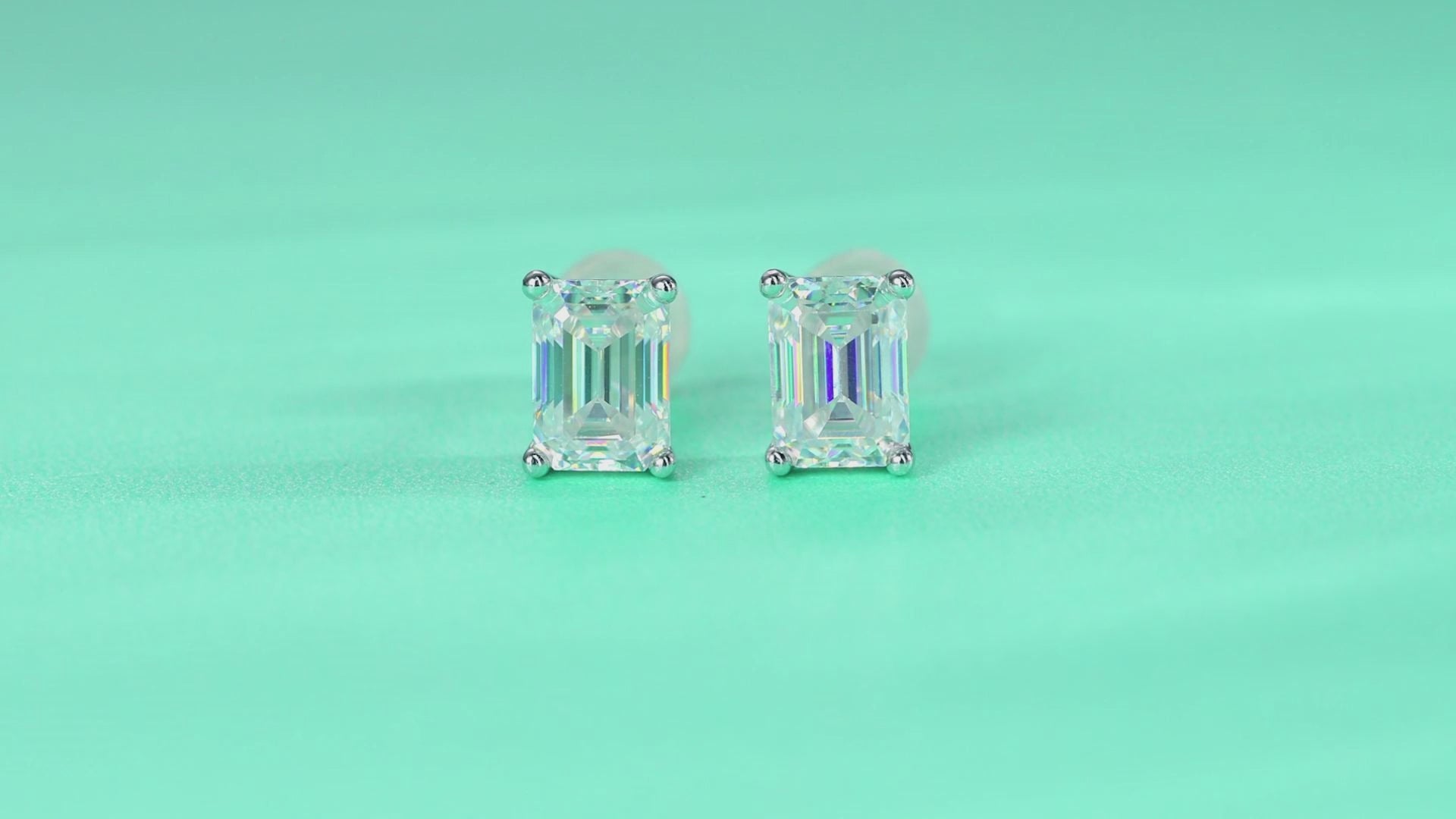 Enthralled Emerald-Cut Moissanite Stud Earrings in Sterling Silver — video