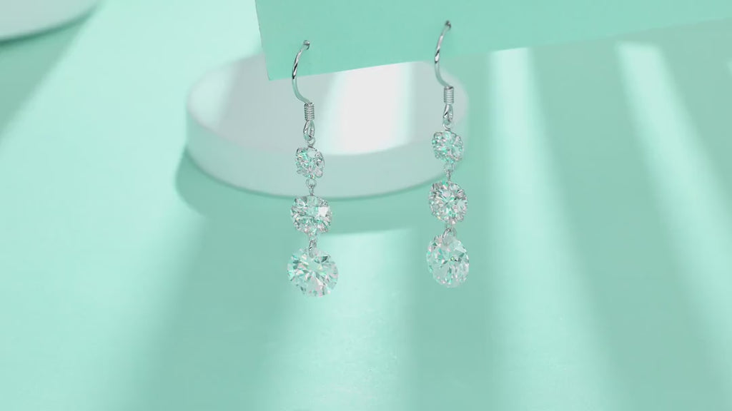 Tiered Moissanite Three-Stone Drop Earrings in Sterling Silver — video