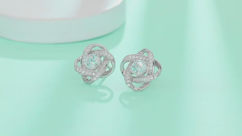 Amity Moissanite Love Knot Stud Earrings in Sterling Silver — video