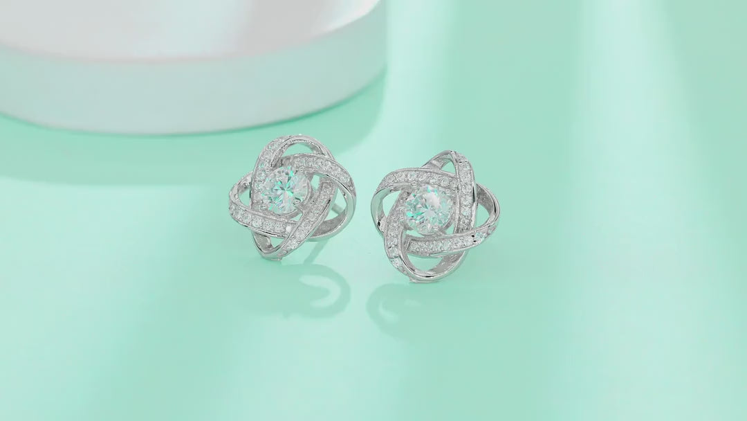 Amity Moissanite Love Knot Stud Earrings in Sterling Silver — video