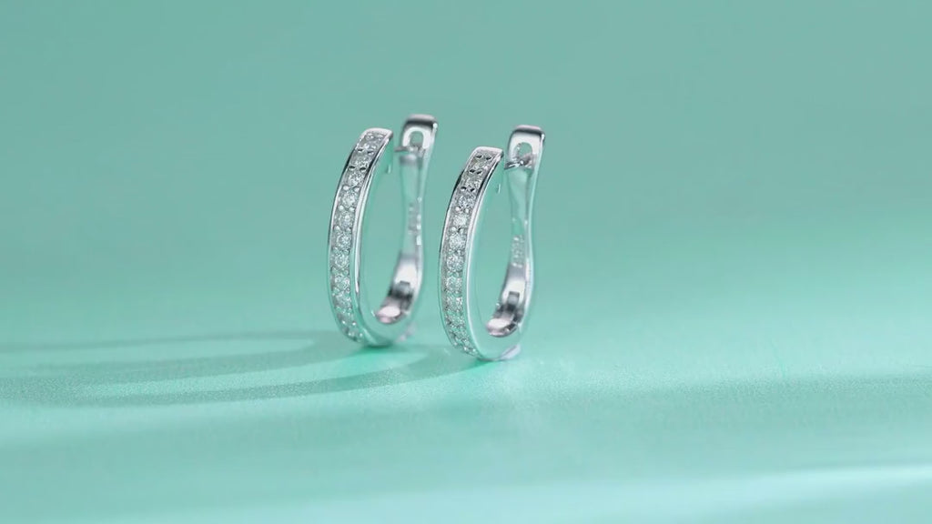Sleek Moissanite Huggie Hoop Earrings in Sterling Silver — video