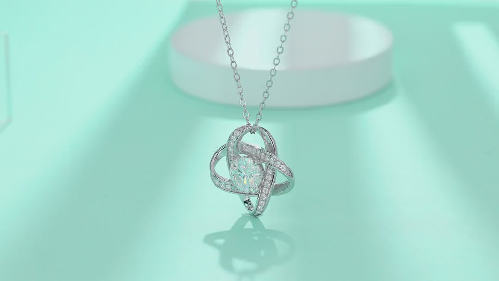 Entwined 1 Carat Moissanite Love Knot Pendant Necklace in Sterling Silver — video