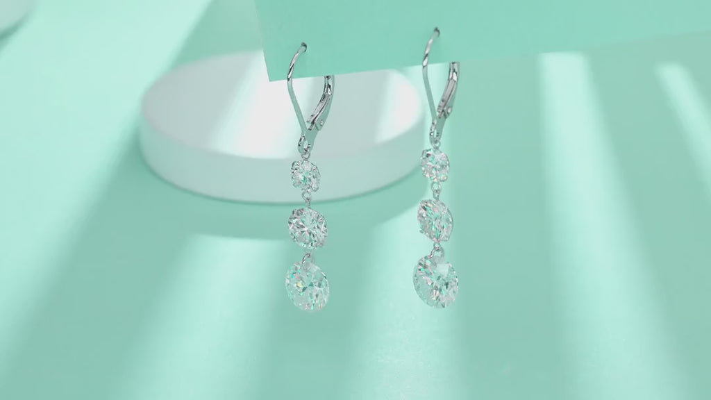 Graduate Moissanite Three-Stone Drop Earrings in Sterling Silver — video
