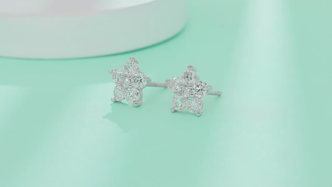 Floret Moissanite Flower Stud Earrings in Sterling Silver — video