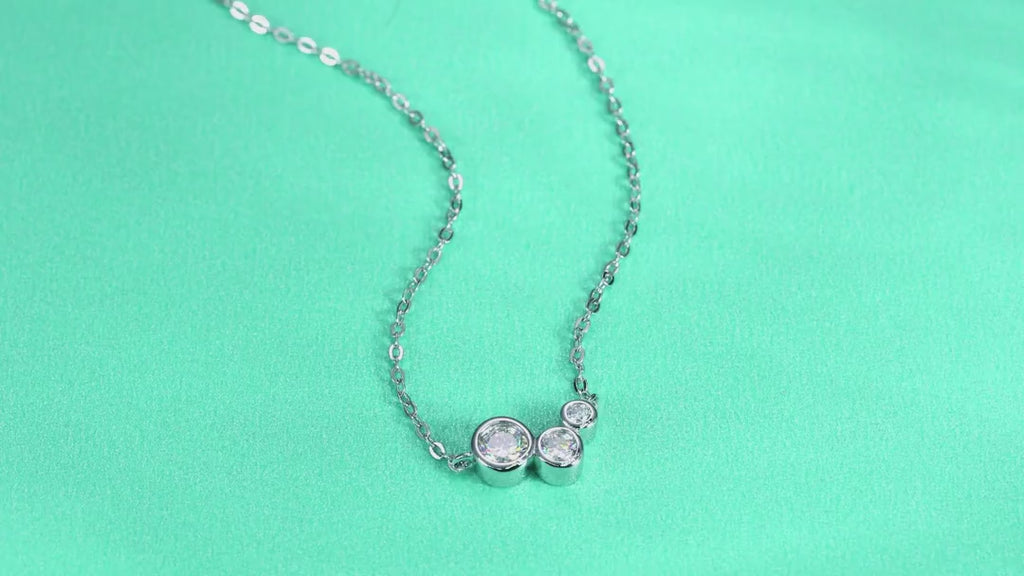 Dewfall Moissanite Three-Stone Necklace in Sterling Silver — video
